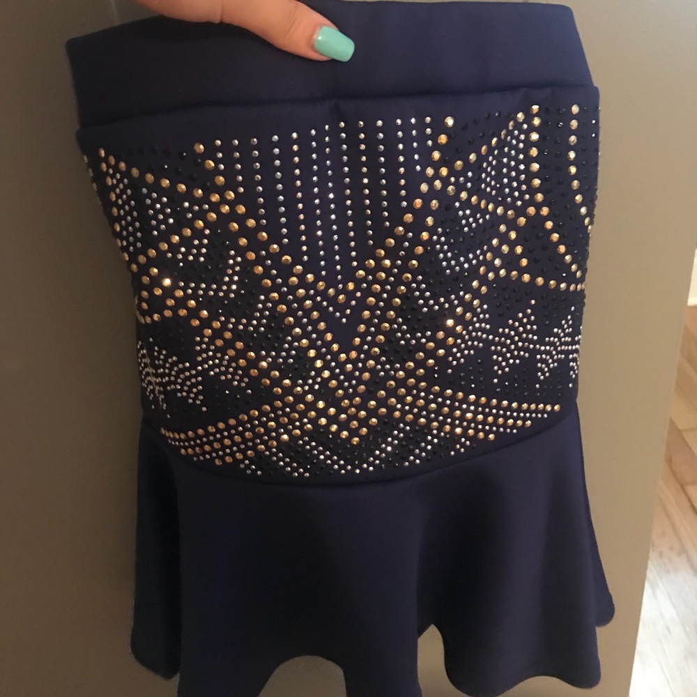 Strapless, jeweled top
